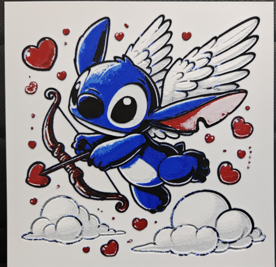 Framed 3D layered art piece featuring an adorable illustration of a cute blue alien character styled as Cupid, flying with white angel wings and holding a wooden bow with a red heart-tipped arrow, floating above soft white clouds and surrounded by small floating red hearts against a light background.