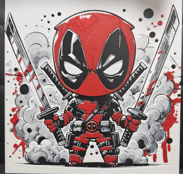 Framed 3D layered art piece featuring a dynamic chibi-style illustration of a masked red and black antihero character holding two swords, surrounded by expressive smoke and splash background accents.