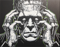 Framed 3D layered art piece featuring a detailed grayscale illustration of a classic horror monster with a flat-topped head and bolts in his neck, gripping his head with both hands against a dark background.
