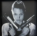 Framed 3D layered art piece featuring a dual pistol heroine in grayscale.