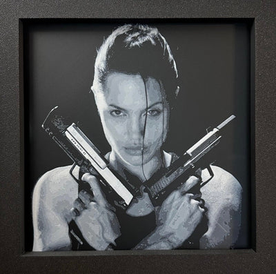 Framed 3D layered art piece featuring a dual pistol heroine in grayscale.