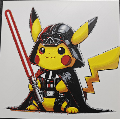 Framed 3D layered art piece from image_9b4fc2.png featuring an adorable illustration of a cute yellow electric mouse character wearing a black alien symbiote costume with a white spider emblem on the chest and a hood shaped like a mouth with sharp teeth against a light background.