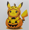 Framed 3D layered art piece from image_9b4eaf.png featuring an adorable illustration of a cute yellow electric mouse character wearing a pumpkin-themed hoodie costume and popping out of a carved orange Jack-o'-lantern against a light gray background.