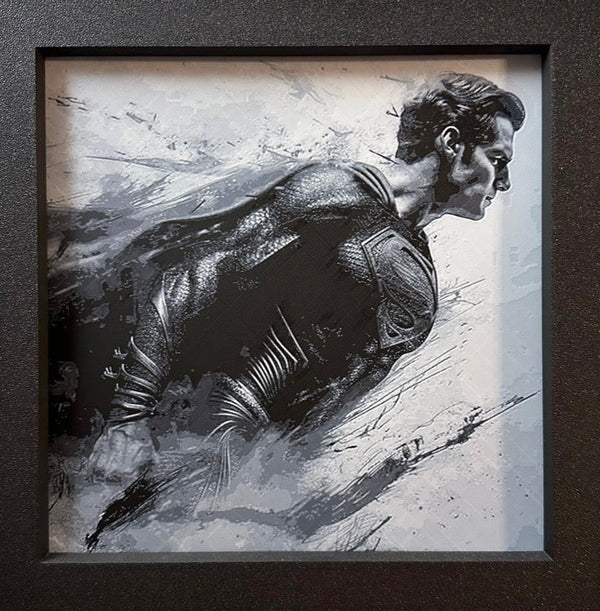 Framed 3D layered art piece featuring a flying superhero in grayscale.