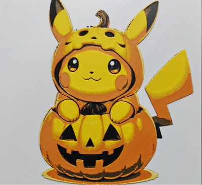 Framed 3D layered art piece from image_0846fb.png featuring a cute yellow electric mouse cartoon character wearing a pumpkin cap and sitting inside a carved orange Halloween jack-o'-lantern on a light background.