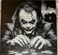 Framed 3D layered art piece featuring a dark, high-contrast monochrome illustration of a manic comic book clown villain with messy hair and a sinister smile, leaning forward against a grim background.
