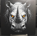 Framed 3D layered art piece featuring a high-contrast monochrome illustration of a sleek robotic or geometric beast head with a fierce expression on a dark background.