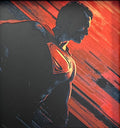 Framed 3D layered art piece featuring a red cape hero in grayscale with red color accents.