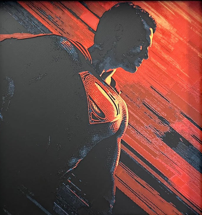 Framed 3D layered art piece featuring a red cape hero in grayscale with red color accents.