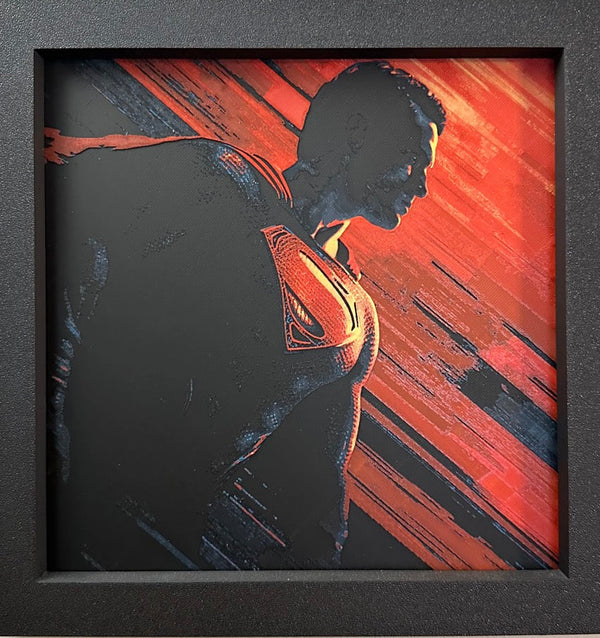 Framed 3D layered art piece featuring a red cape hero in grayscale with red color accents.