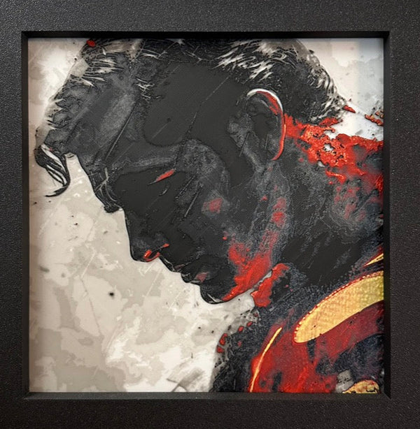 Framed 3D layered art piece featuring a red cape hero in grayscale with red color accents.