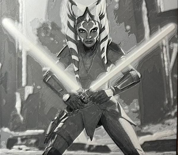 Framed 3D layered art piece featuring a sci-fi dual saber warrior in grayscale.