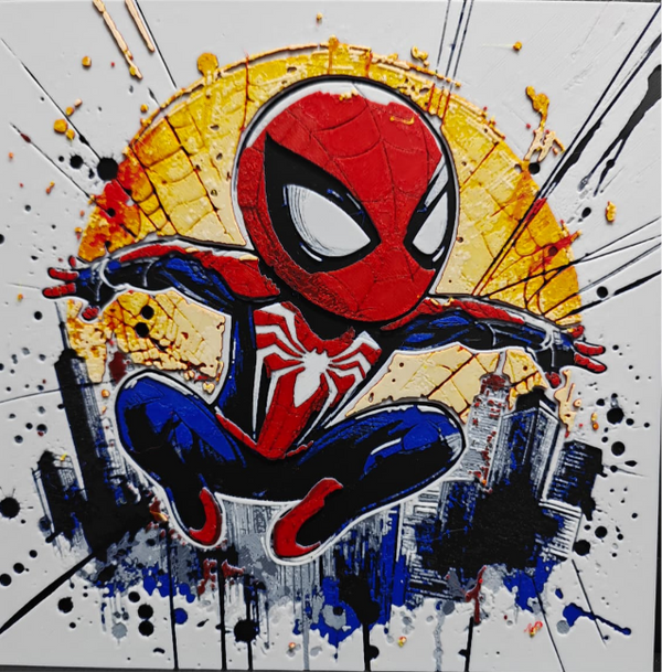 Framed 3D layered art piece visible in image_41fdfe.png featuring a dynamic chibi illustration of a classic red and blue spider hero character with a prominent white spider emblem on his chest, leaping in mid-air against a vibrant abstract background with a large yellow circle, city silhouettes, and paint splatters.