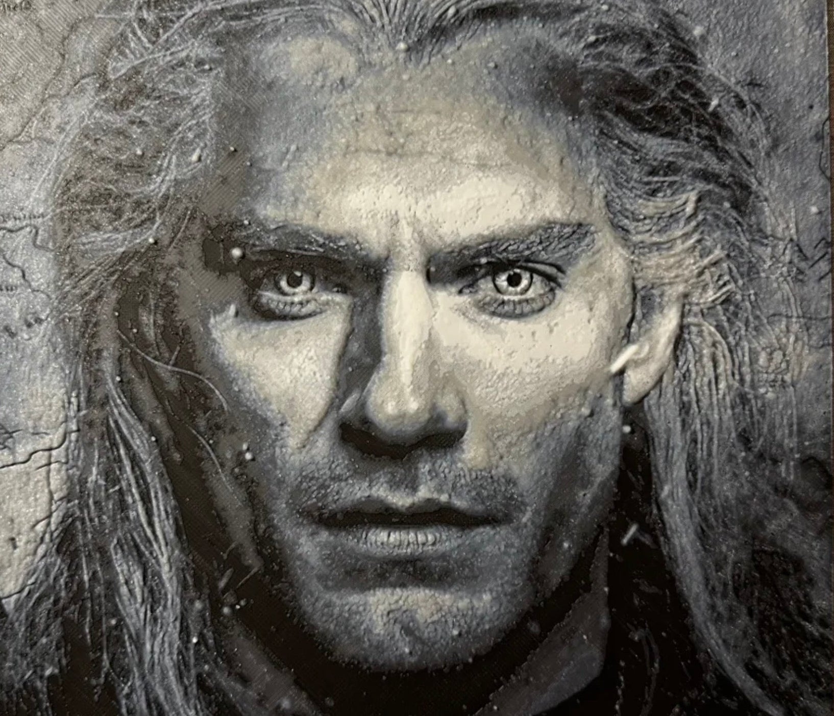 Framed 3D layered art piece featuring a white wolf hunter in grayscale.