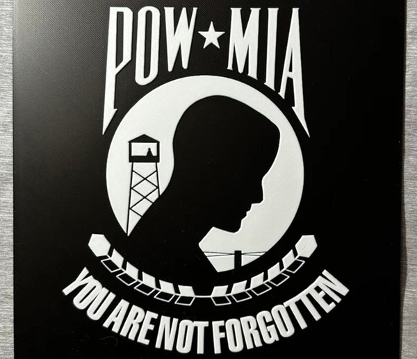Framed 3D layered art piece featuring the POW/MIA flag in grayscale.