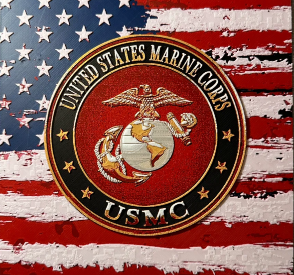 Framed 3D layered art piece featuring U.S. Marine Corps emblem over stylized American flag in red white and blue