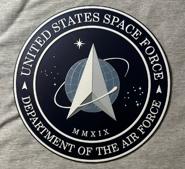 Framed 3D layered art piece featuring the U.S. Space Force emblem on a gray background.