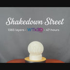 Shakedown Street signature lamp by WTx3D rotating, showing the 3D printed layered shell and the light and shadow it casts