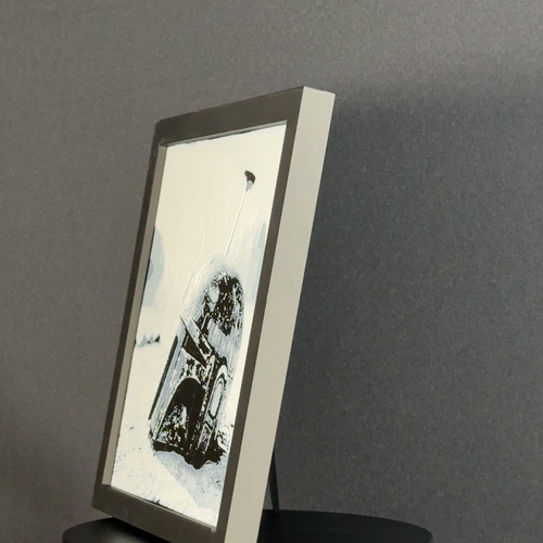 Side view of WTx3D framed 3D layered art showing the physical stacked layers and real depth of the artwork inside the charcoal matte frame